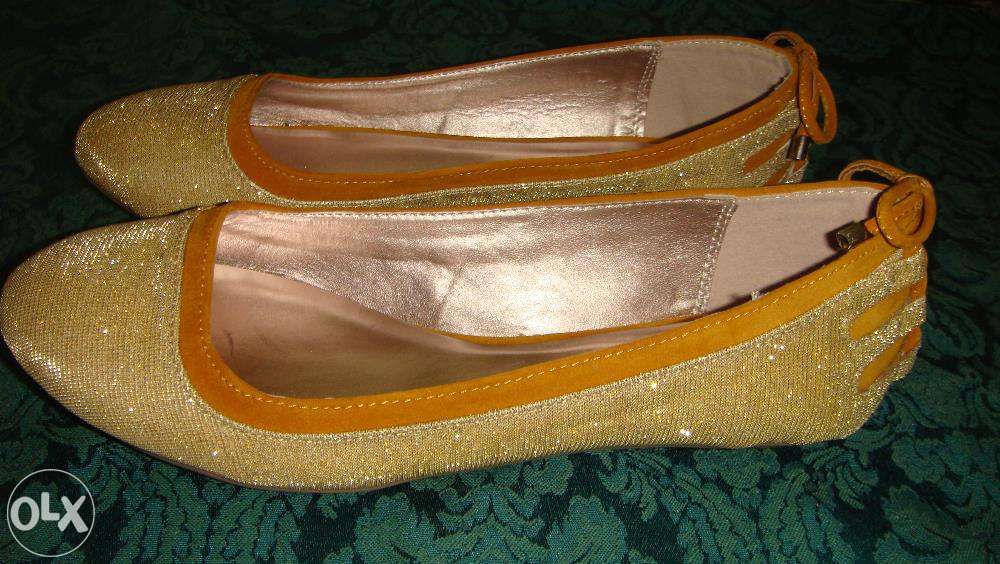 Очень красивые золотистые балетки Qupid