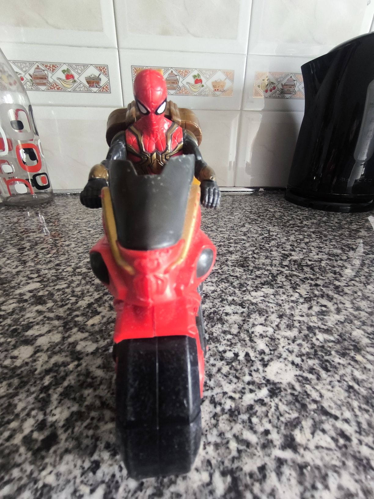 Brinquedo moto do homem aranha