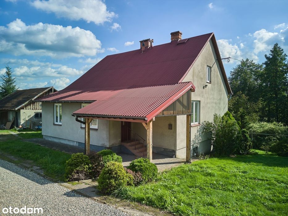 Parterowy dom jednorodzinny z ogrodem na południe.