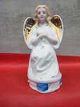 Przedwojenna figurka,porcelanowa Anioł Stróż