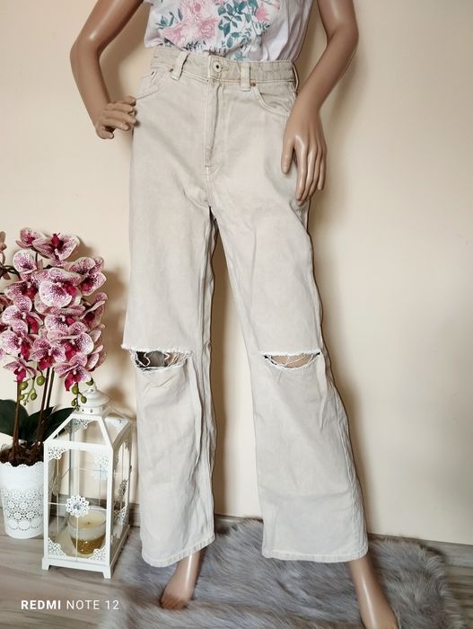 Szerokie spodnie dżinsowe wysoki stan rozdarcia dziury