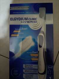 Elgydium clinic hybrid + 2 pasta dentária buccotherm
Escova de dentes