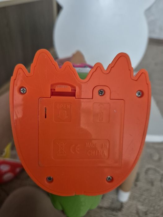 Попугай-сказочник музыкальная игрушка