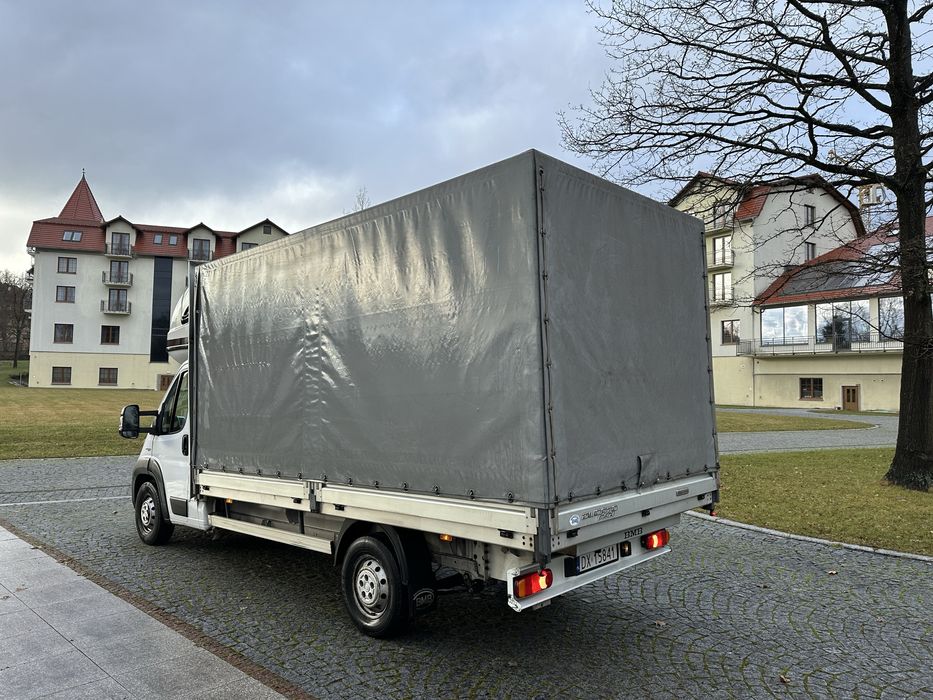 Wynajem Fiat Ducato 2.3 diesel Maxi 180 koni plandeka 9 palet.