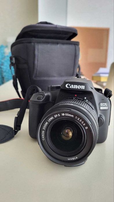 Дзеркальна фотокамера Canon EOS 4000D в повній комплектації з сумкою