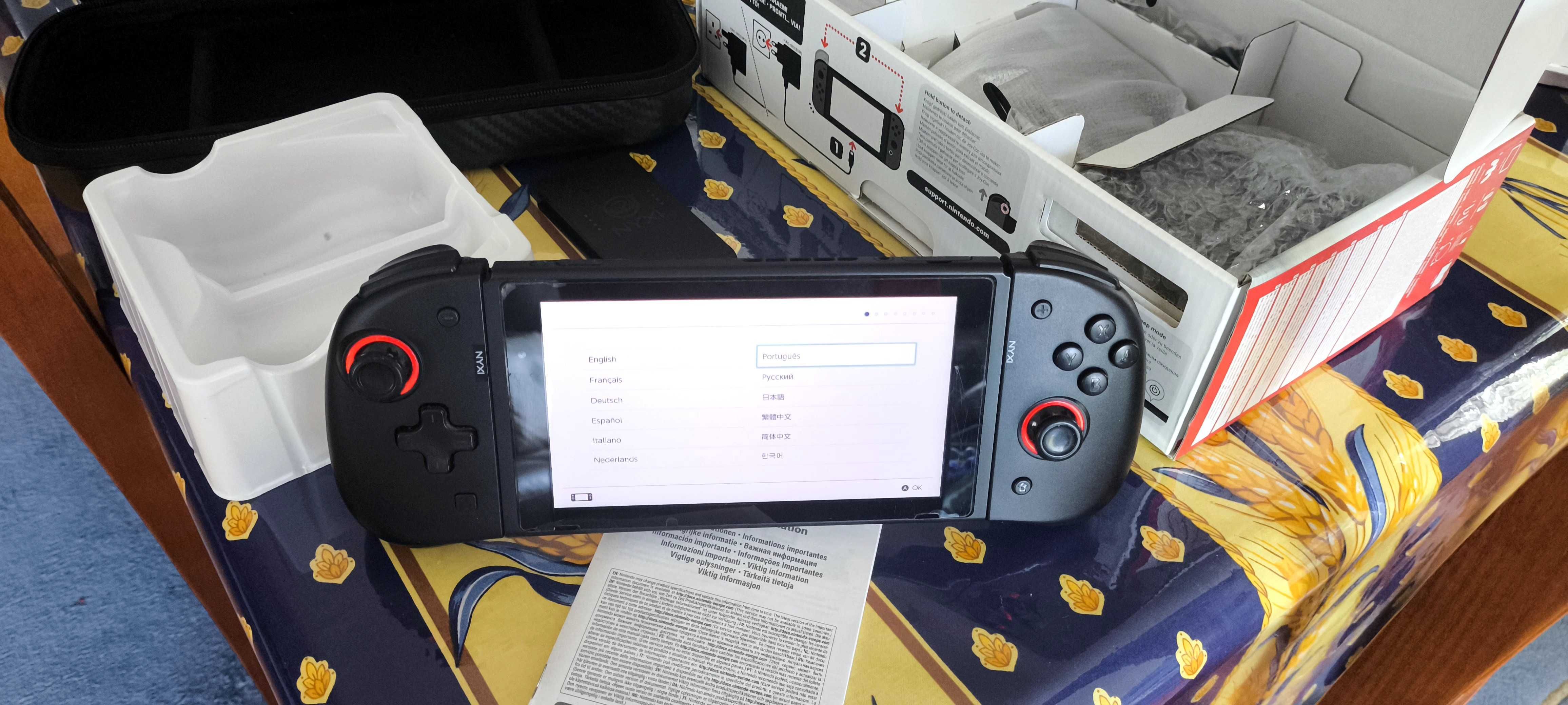 Nintendo switch v1 com joycon pro e mala de viagem nixy