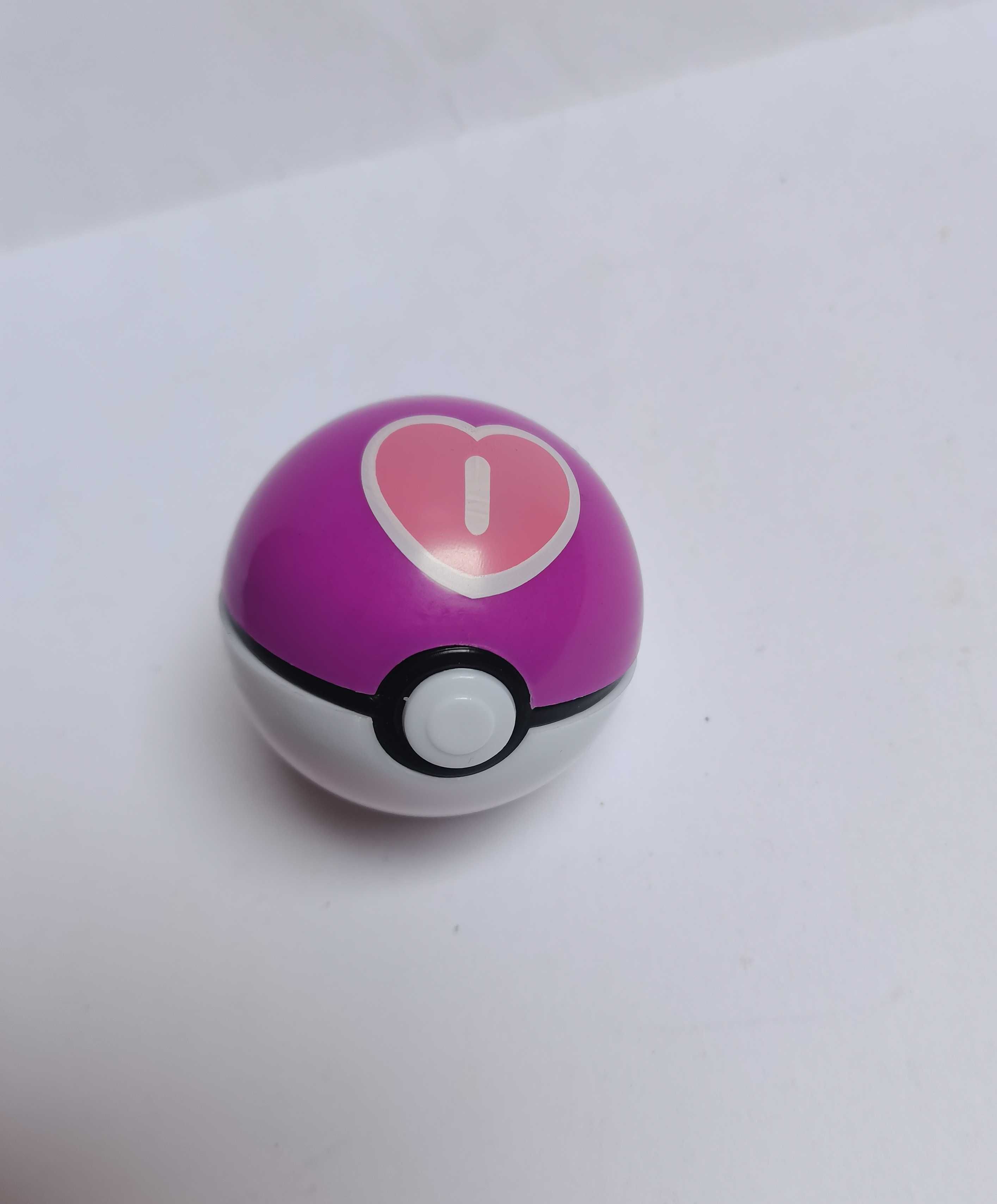 Pokeball z mini figurką Pokemon (niespodzianką) [1. Ciemnoróżowy]