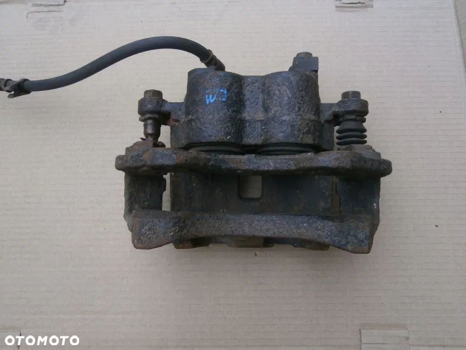 Zacisk Hamulcowy Przód lewy Jeep Grand Cherokee 2,7 Crd Wj