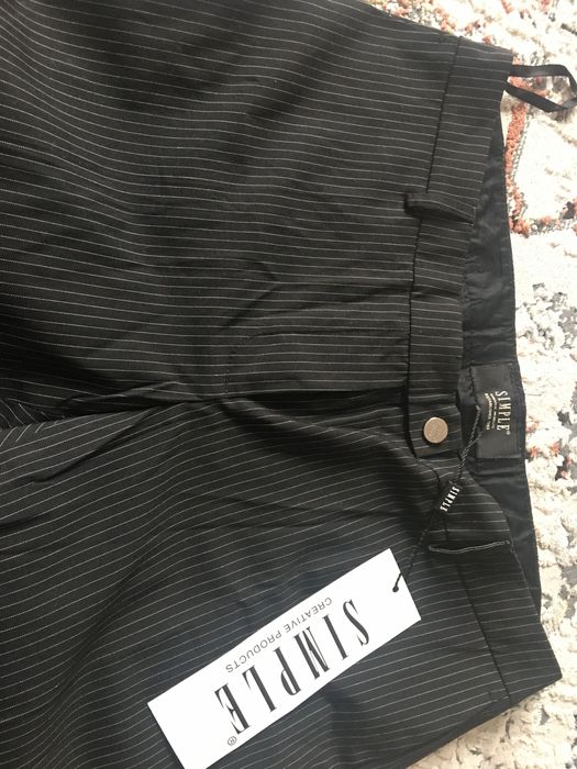 Spodnie 36 simple w tenisowy prążek