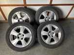 Felgi aluminiowe 15” OPEL 4x100 ET43 z oponami całorocznymi 2021r