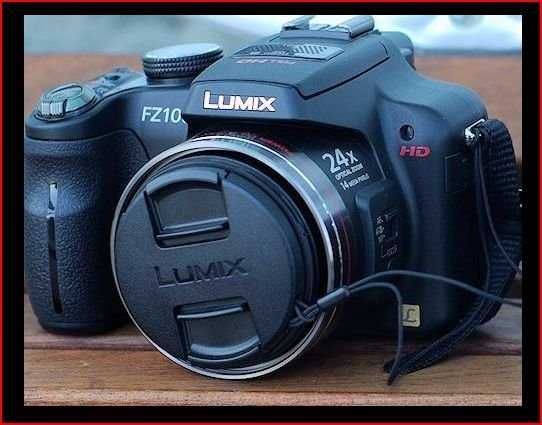 Lumix FZ-100 / Objectiva Leica + acessórios