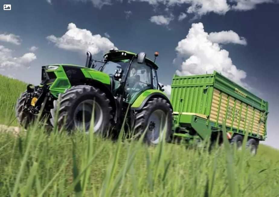 Zbiór traw przyczepą samozbierającą Krone, zbiór kukurydzy