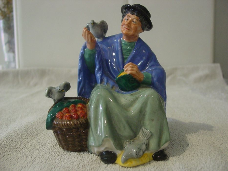 Estatueta em porcelana inglesa (Royal Doulton)