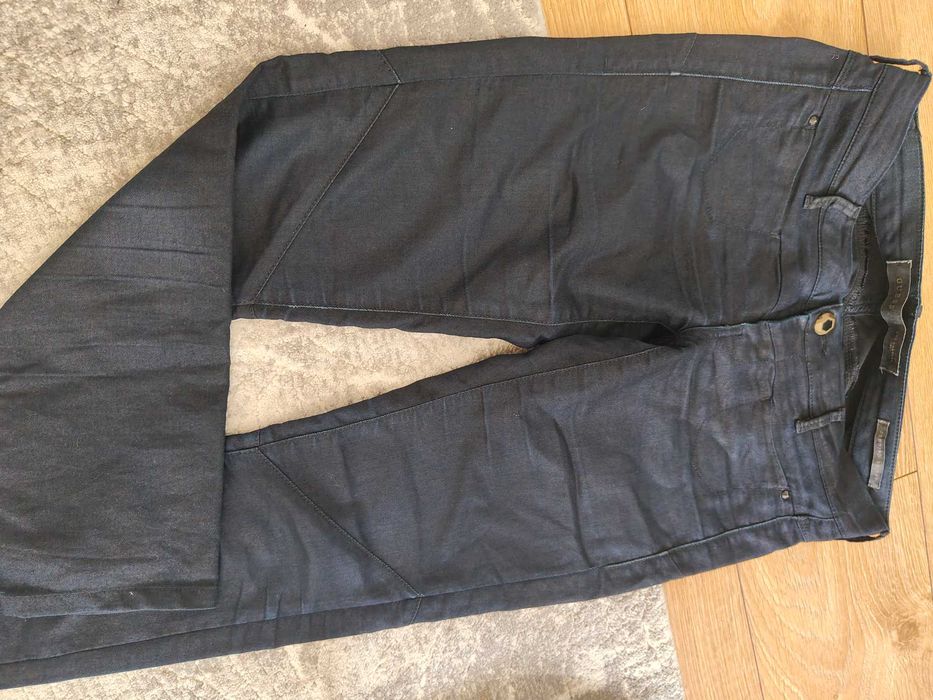 Spodnie woskowane Guess