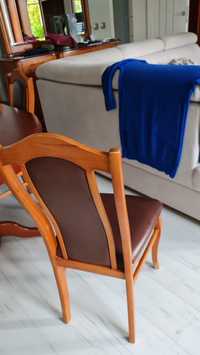 Stół i 8 krzeseł z obiciem skórzanym