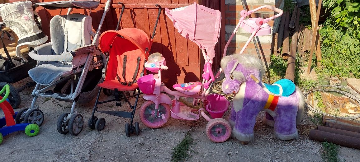 Продам детские коляски,люлька,кресло,игрушки