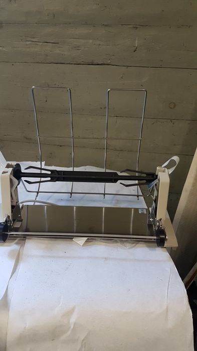 Пристрій подачі рулонного паперу в принтер