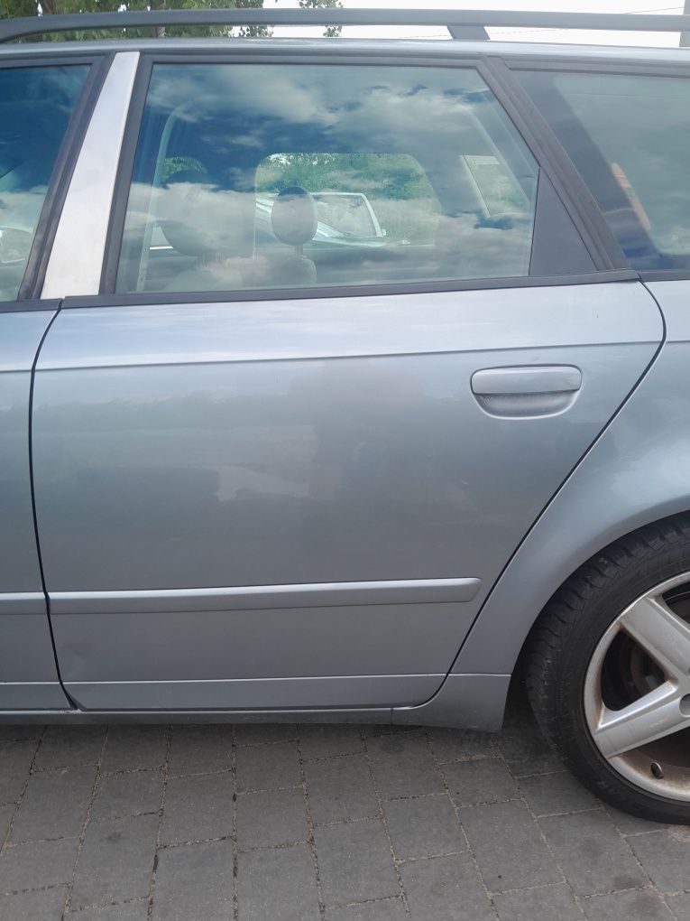 Drzwi lewy tył Audi a4 b7 kod lakieru LY7G