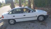 Vende se Opel astra batendo tuxo porém rodando normal