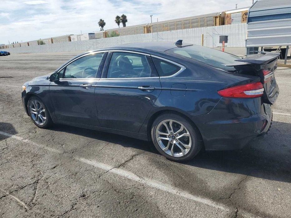 2020 Ford Fusion Hybrid на автовозі