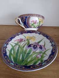 Porcelanowa filiżanka ze spodkiem talerzykiem porcelana w kwiaty