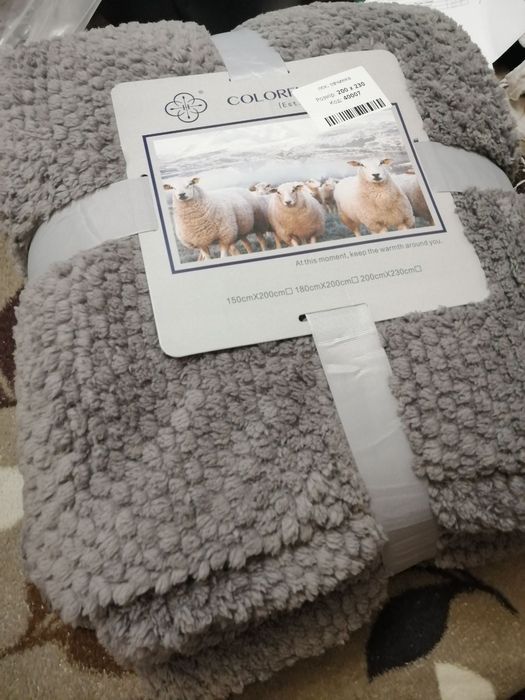 Теплі пледи на штучний овчині