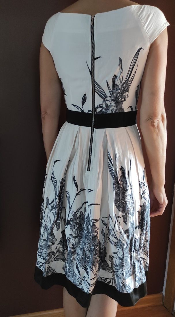 Sukienka Orsay biała rozkloszowana rozmiar M 38