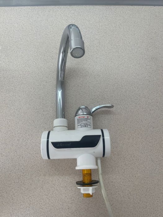 Продам проточный водонагреватель Delimano