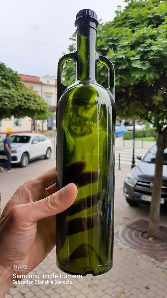 Stara szklana butelka z uszami kolor zieleń butelkowa vintage prl