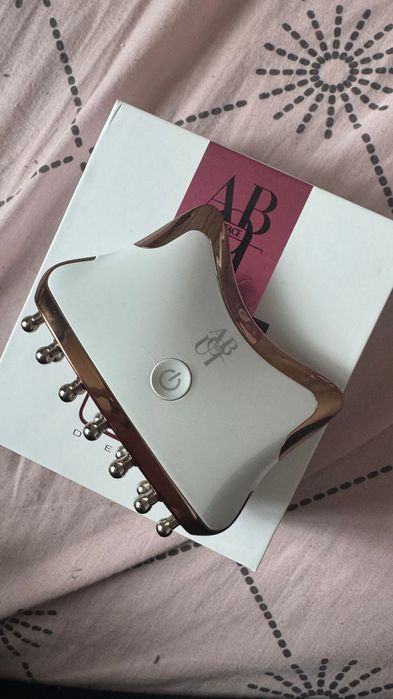 Масажер доя обличчя та тіла