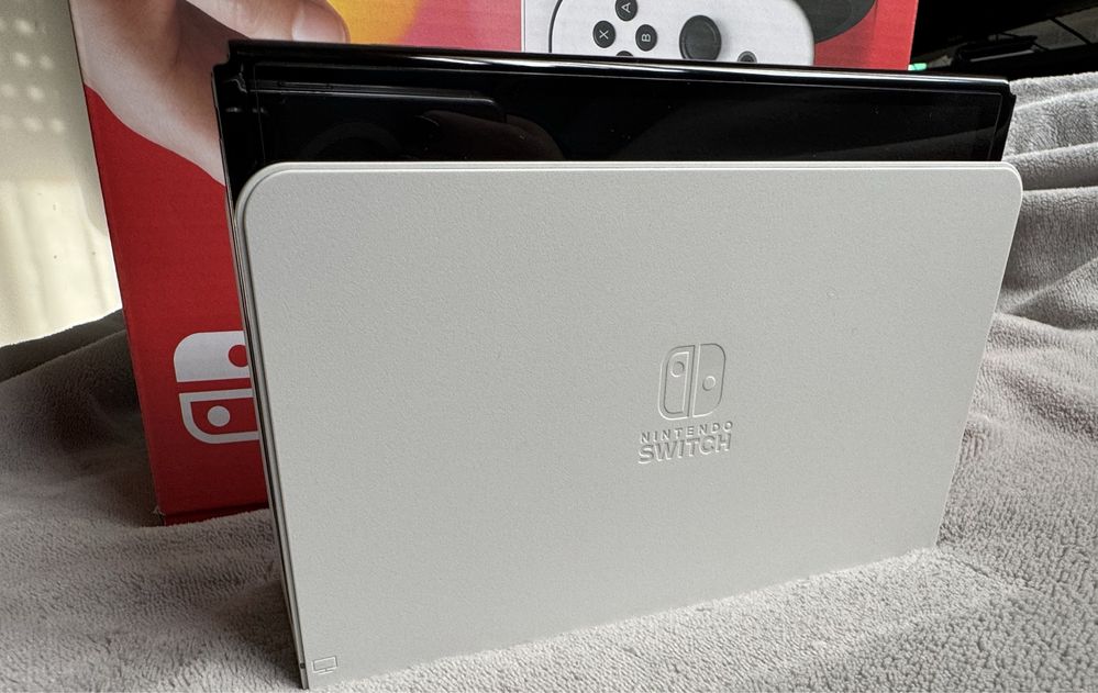 Nintendo Switch OLED (como nova) + jogos