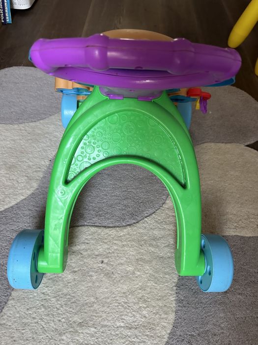 Interaktywny chodzik pchacz jeździk Fisher Price