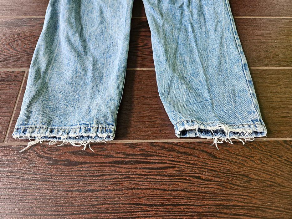 Niebieskie poprzecierane jeansy damskie, proste, Never Denim, rozm. 27