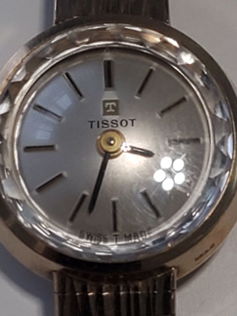 Золотые часы Tissot