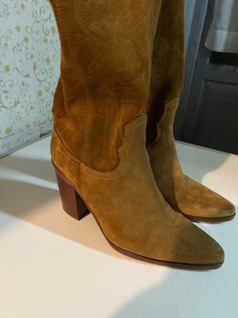 Botas cano alto Novas
