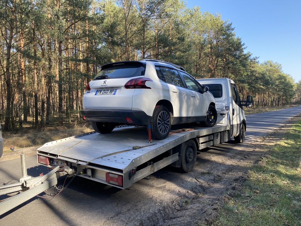 Transport pojazdow autopomoc holowanie 24h maszyn rolniczych laweta