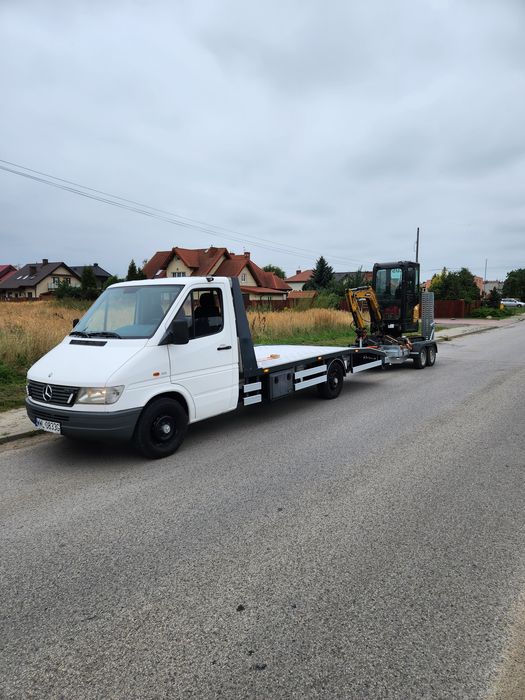 Pomoc drogowa Radzymin Marki S8 transport aut holowanie