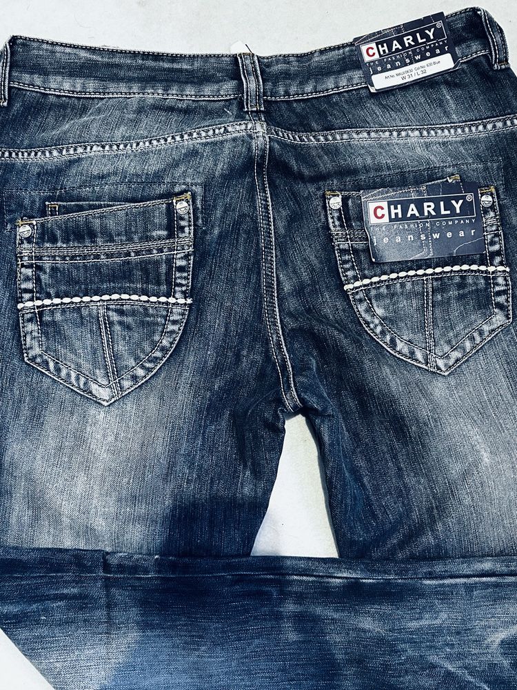 Spodnie jeansowe meskie Charly przetarcia nowe