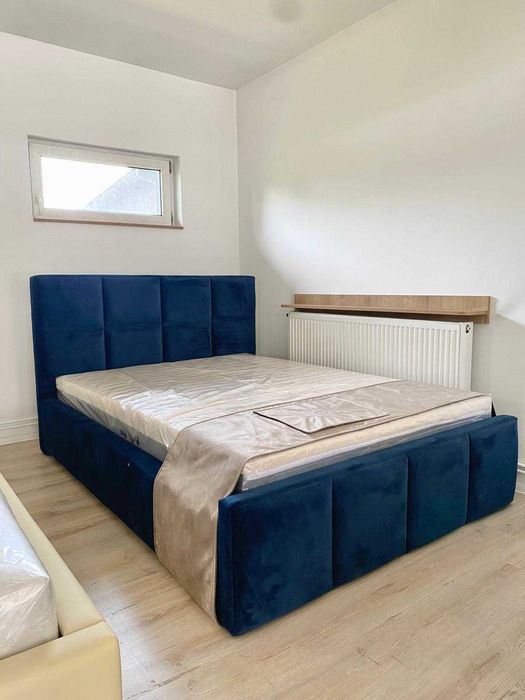 Łóżko tapicerowane ze stelażem podnoszonym pod materac 140x200
