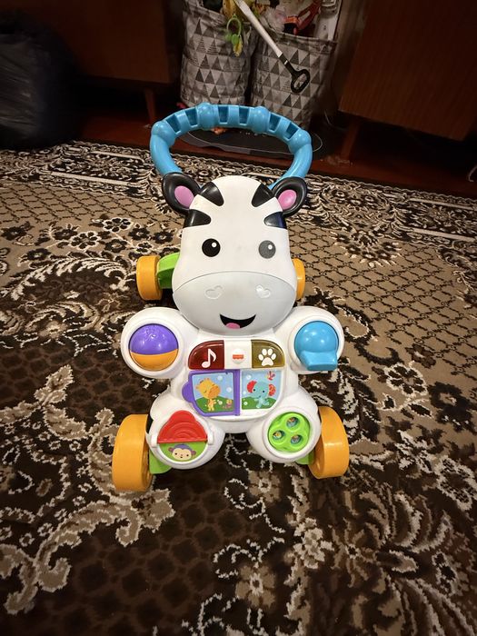 Ходунки-толкатор,розвиваючий, музичний центр Fisher-price