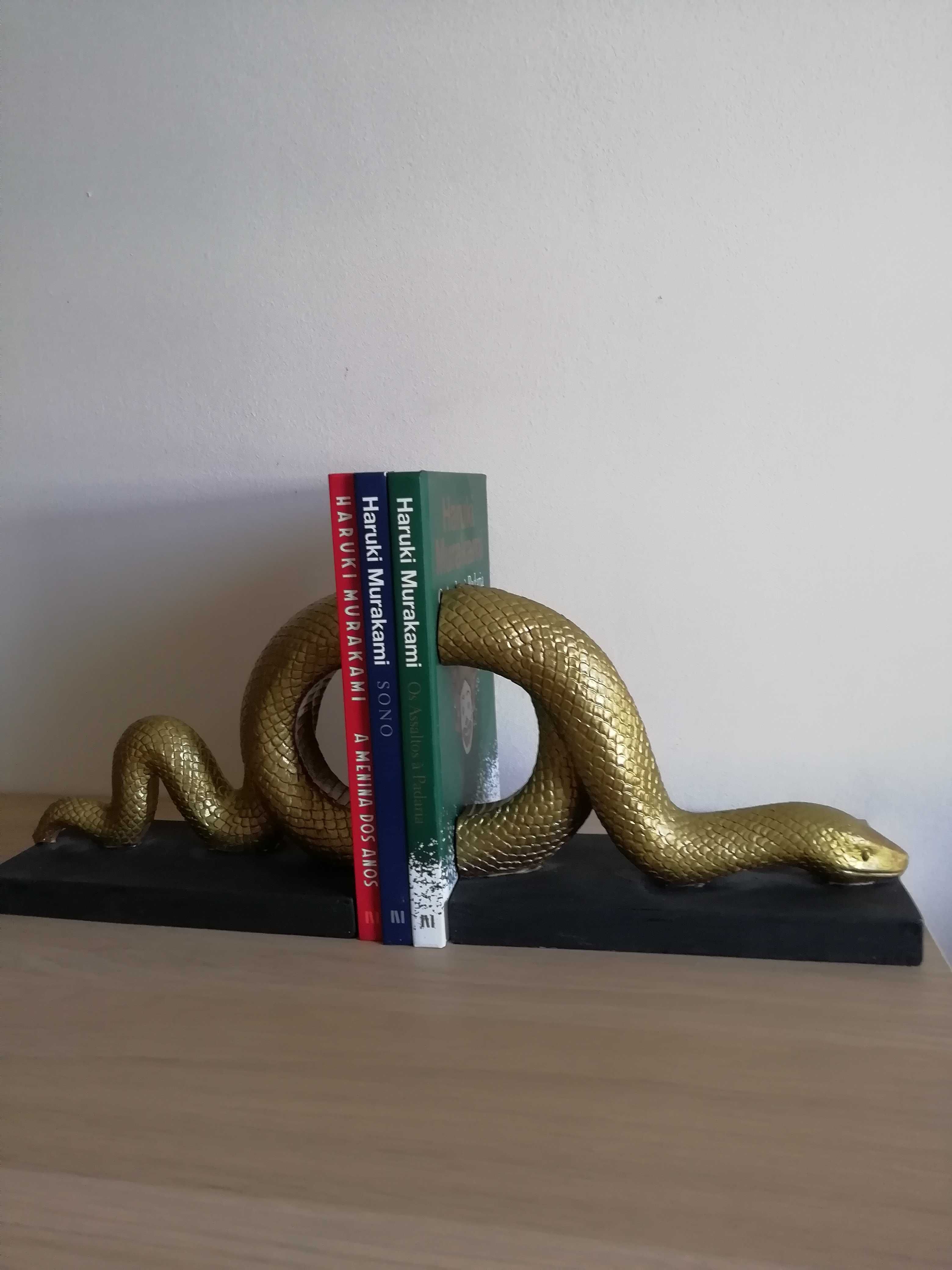 Vendo suporte para livros em pedra preto e dourado, práticamente novo.