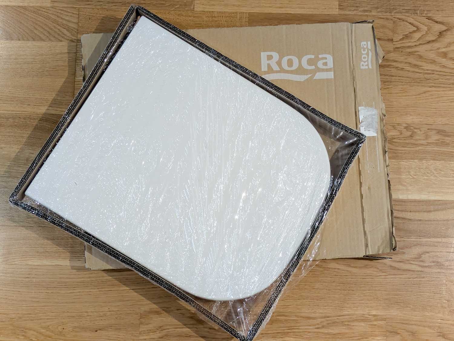 Tampa de sanita com queda amortecida Roca