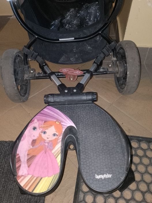 Dostawką do wózka BumpRider