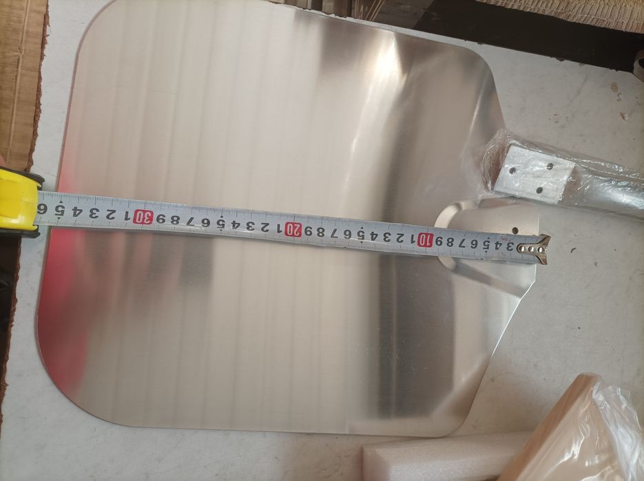 kamień z łopata do pizzy