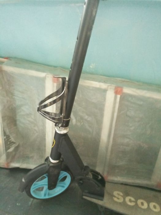 Самокат для дитини чи підлітка