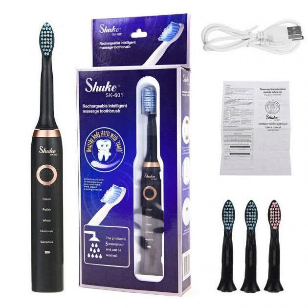 бiла електрична зубна щітка з 4 насадками