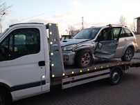 holowanie usługi przewoz laweta auto-laweta Pomoc Drogowa