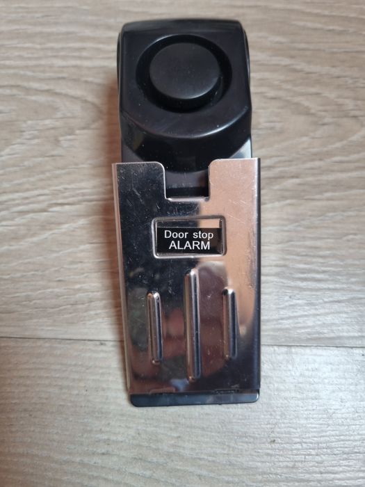 Alarm zatrzymujący drzwi,