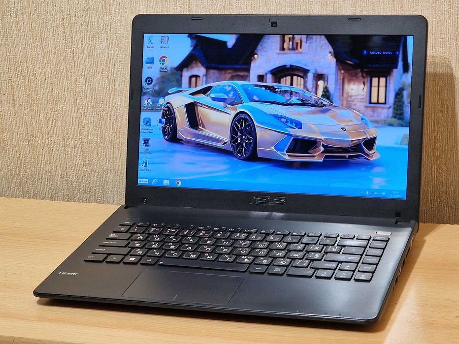 Ноутбук Asus Intel Celeron 1000M RAM 4Gb Батарея тримає 6 годин.