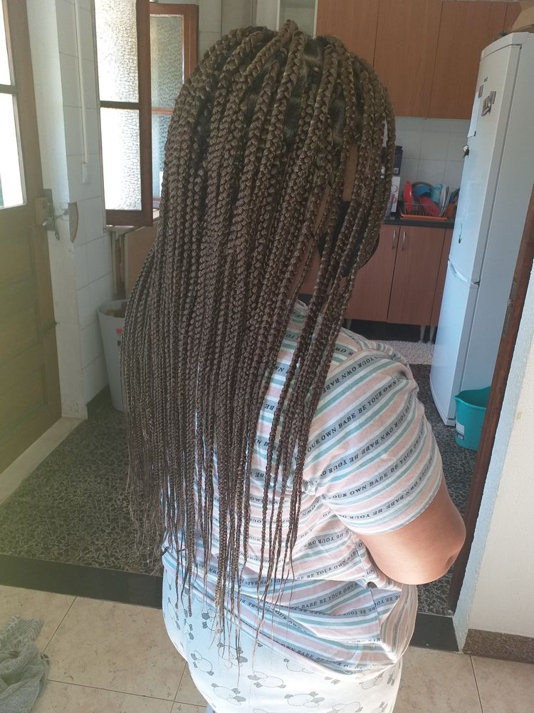 Tranças africana e aplicação e crochet ao domicílio